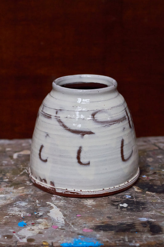 Wide low slipware vase