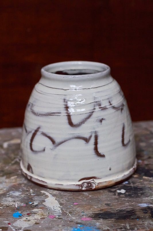 Wide low slipware vase